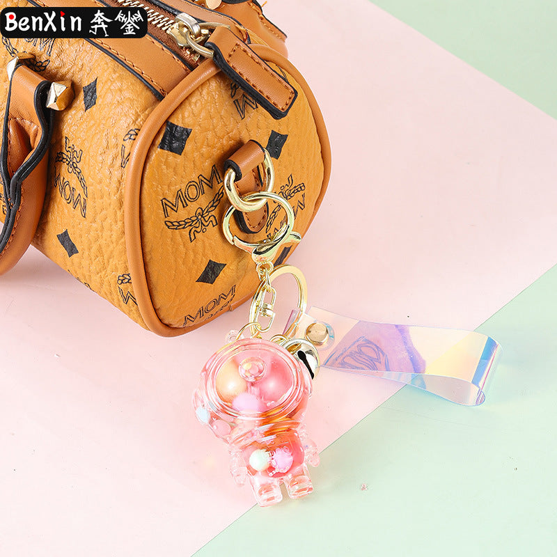 Wholesale Acrylic Fueled Spaceship Astronaut Luminous Quicksand Bottle Keychain